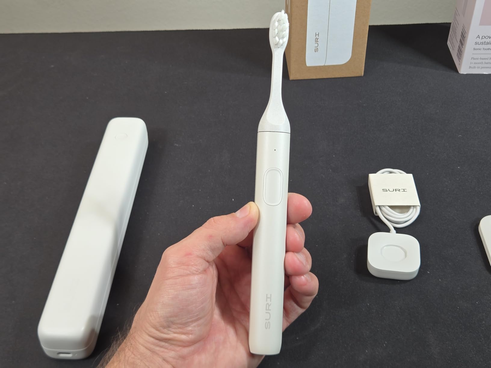 SURI Pro Sonic Electric Toothbrush | Over 4+ Weeks Battery | UV Cleaning Travel Case | Pressure Sensor | Aluminium Body | 2-Minute Timer | Plant-Based Heads | Green customer photo 1